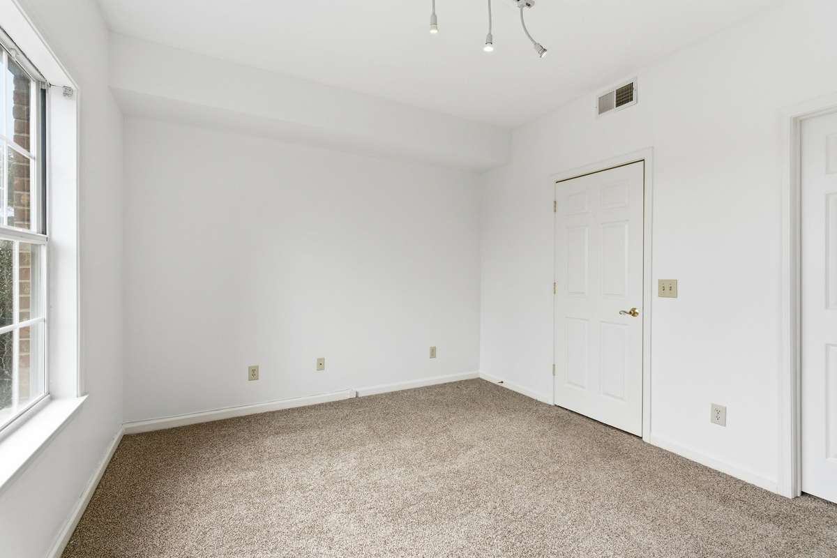 Freshly painted guest bedroom with a large closet