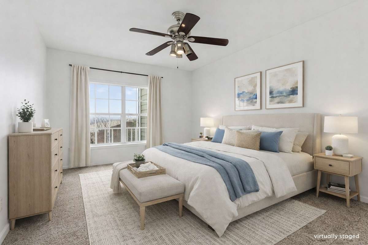 Large primary bedroom with views of the hills
*virtually staged*