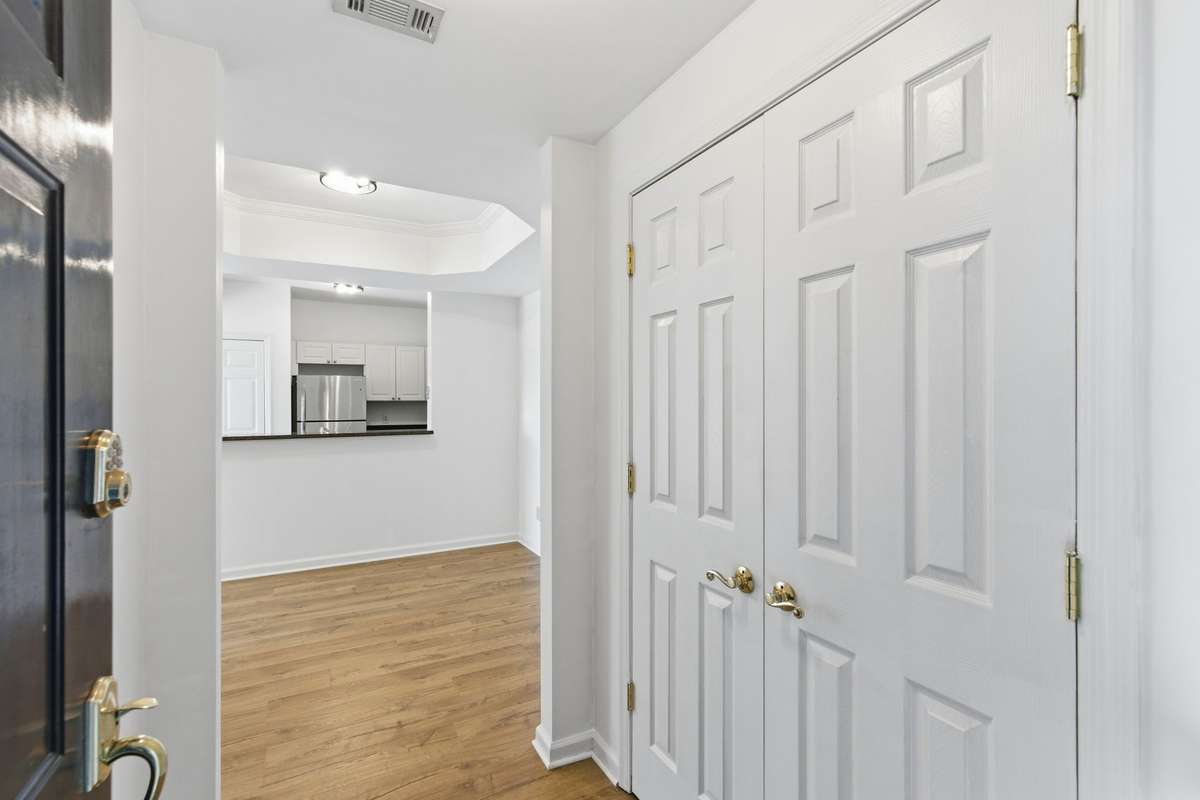 Bright entryway with large coat closet