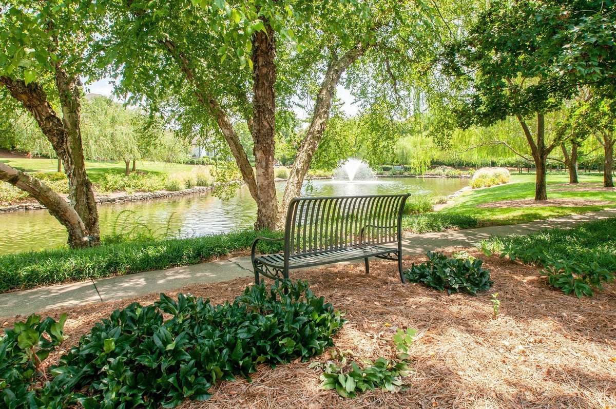 The neighborhood has multiple walking paths and scenic ponds.