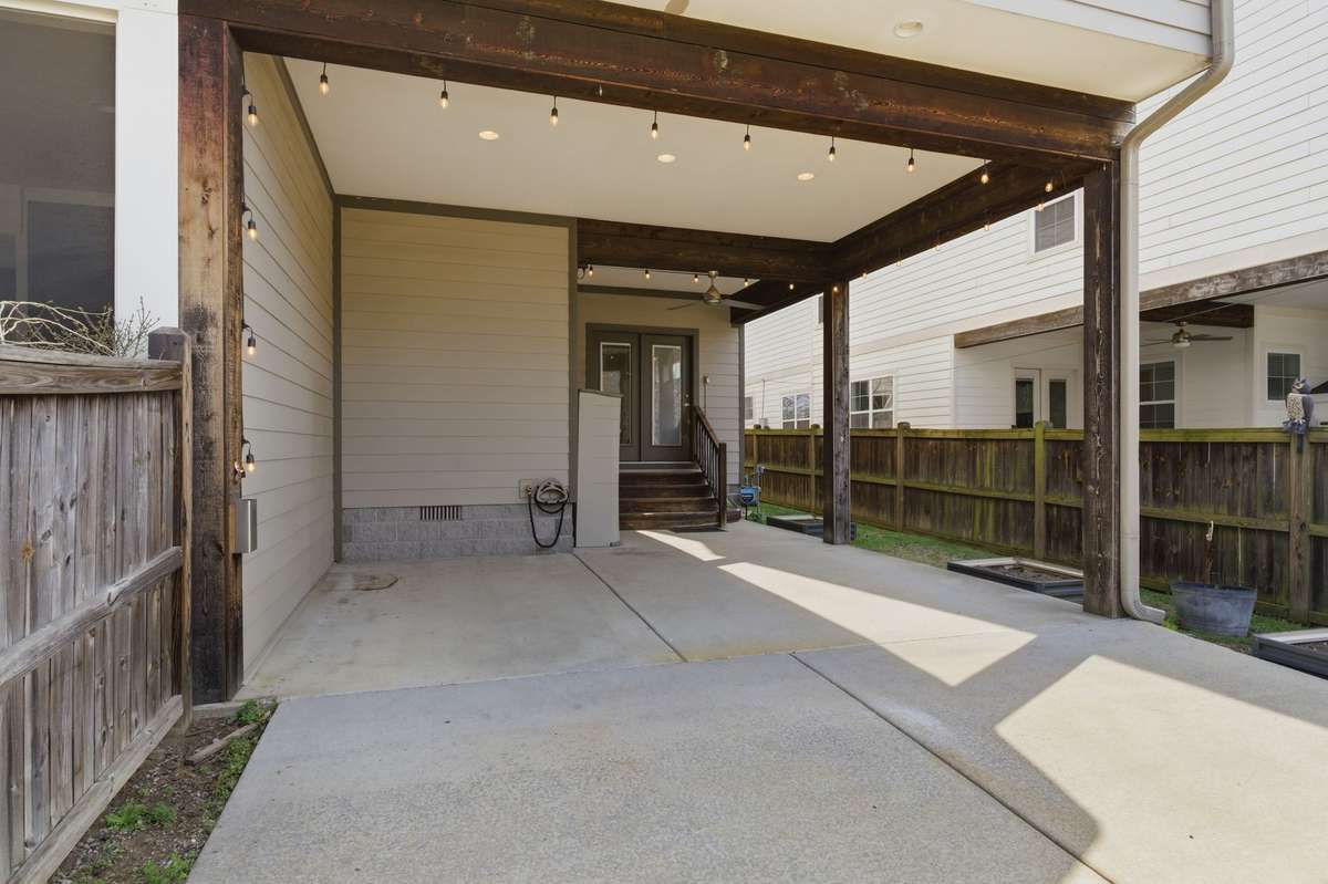 Carport can be converted to a garage or used as outdoor patio space.