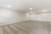 Wow! Check out this huge lower level basement rec room! Ping pong table, Movie room, the options are endless!