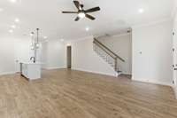 Check out his amazing open concept living with kitchen, dining and great room combination.