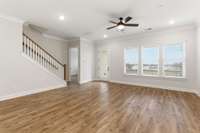 The wall of windows allows a lot of natural light in the room plus the patio door leads to a huge covered deck with amazing views.