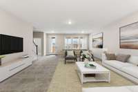 The lower level basement is staged in this picture to show seating area with tv on one end and gameroom with pool table on the other end. The rec room is huge so your possibilities are endless as to what you can do.