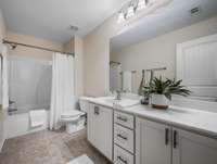 Guest Bathroom w/ Combo Tub/Shower
Double Vanities
