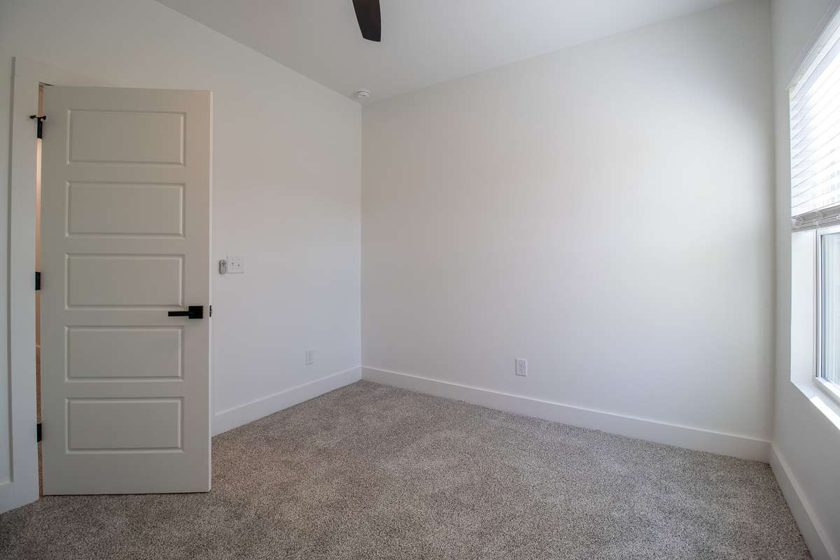 Secondary bedrooms are warm and inviting with plenty of natural light and walk-in closets!
