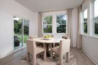 ***Photo From Winters Model Home - Options May Vary***

Flooded with natural light, this cheerful breakfast area features walls of windows that overlook the backyard, creating a warm and inviting space for casual dining.