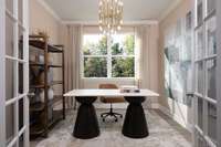 ***Photo From Winters Model Home - Options May Vary***

Ideal for working from home, quiet reading, or formal dining, this dedicated study features elegant French doors that provide privacy, charm and a touch of elegance.