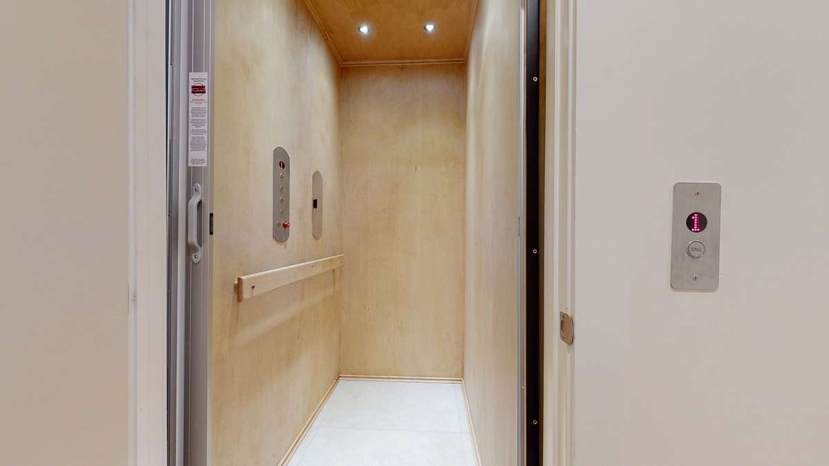 Elevator with automatic door