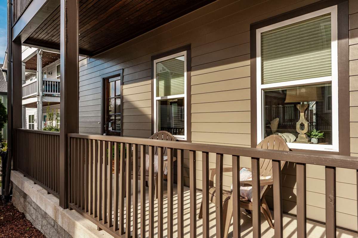 Inviting covered front porch offers the perfect spot for rocking chairs, morning coffee, or evening relaxation.