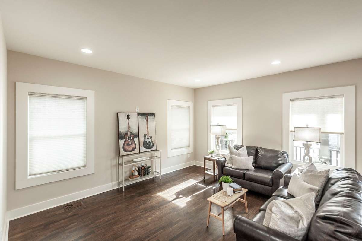 Generous living room size allows for oversized furniture and flexible seating arrangements.