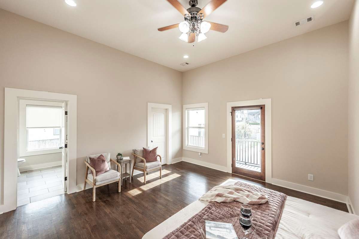 The private covered deck off the primary suite offers a quiet outdoor retreat just steps from the bedroom.