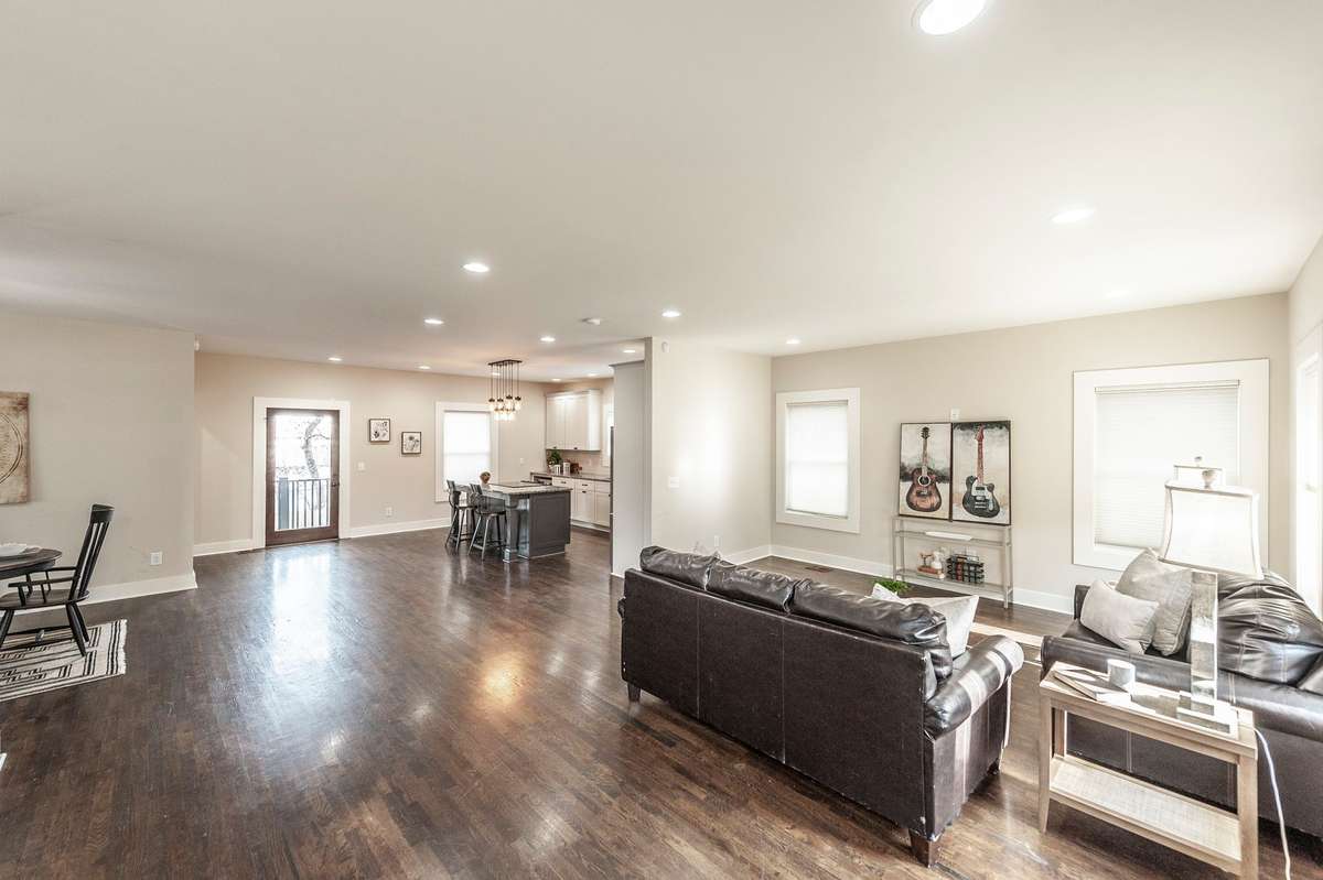 Step inside to a wide-open floor plan with beautifully stained hardwood floors and an abundance of natural light.