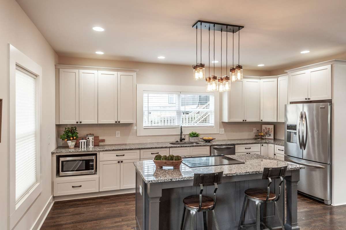 Stainless steel appliances add modern style and everyday functionality to the kitchen.