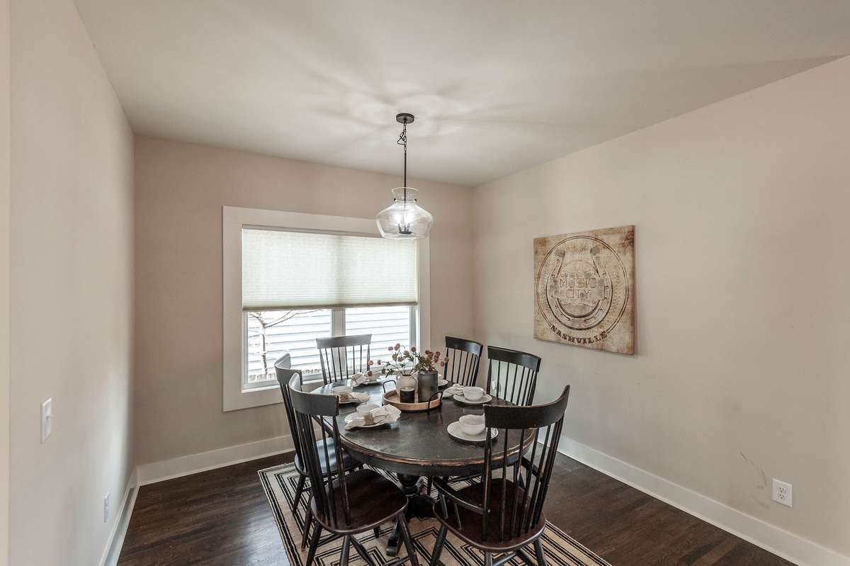 Dining area features hardwood floors and ample space for hosting dinners both casual and formal.
