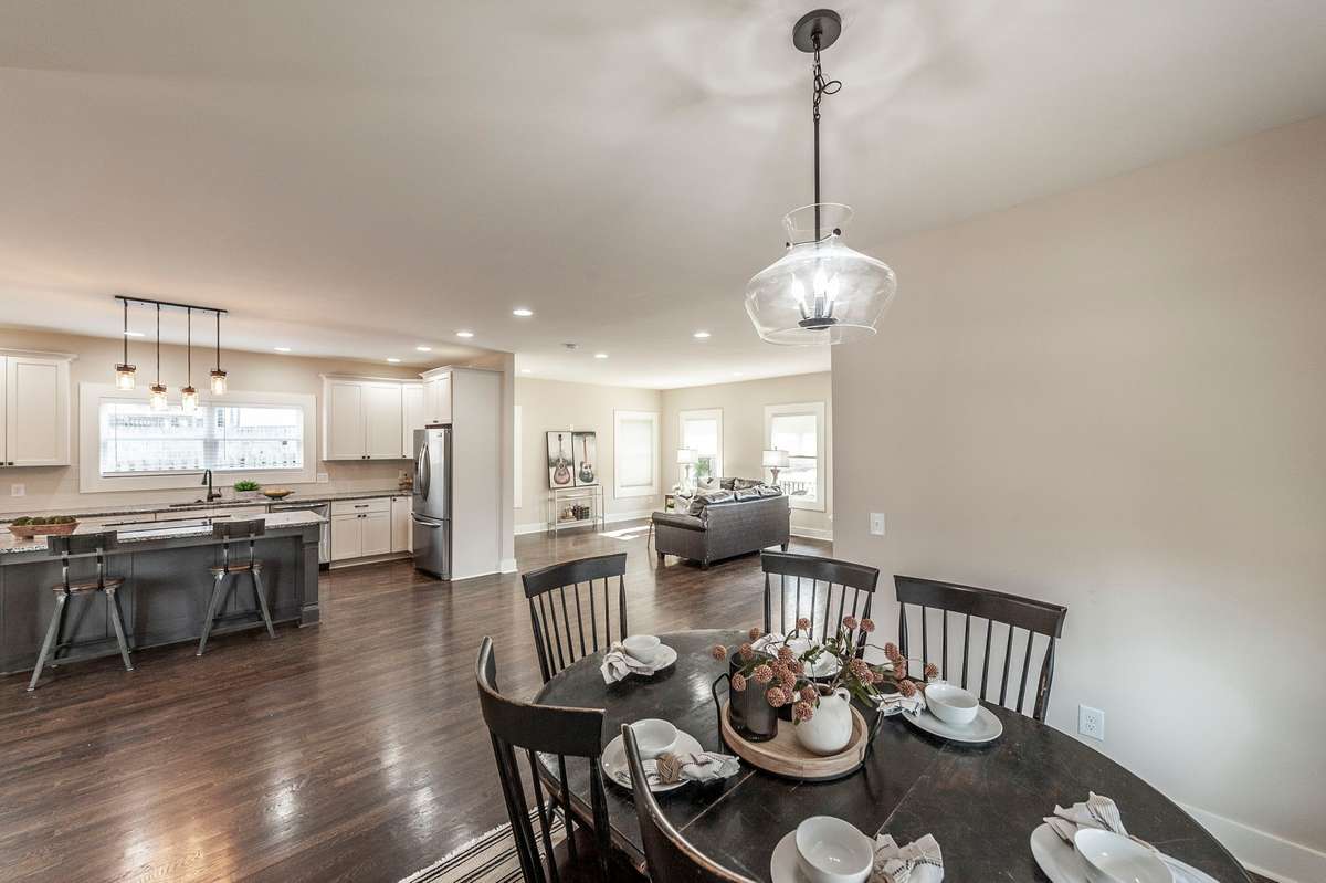 Open dining space flows seamlessly from the living room, making it ideal for entertaining and gatherings.