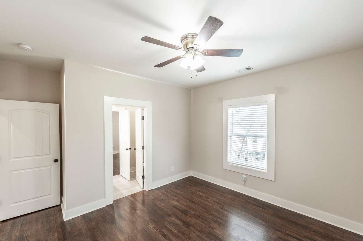 Both guest bedrooms feature beautiful hardwood floors and spacious closets for ample storage.