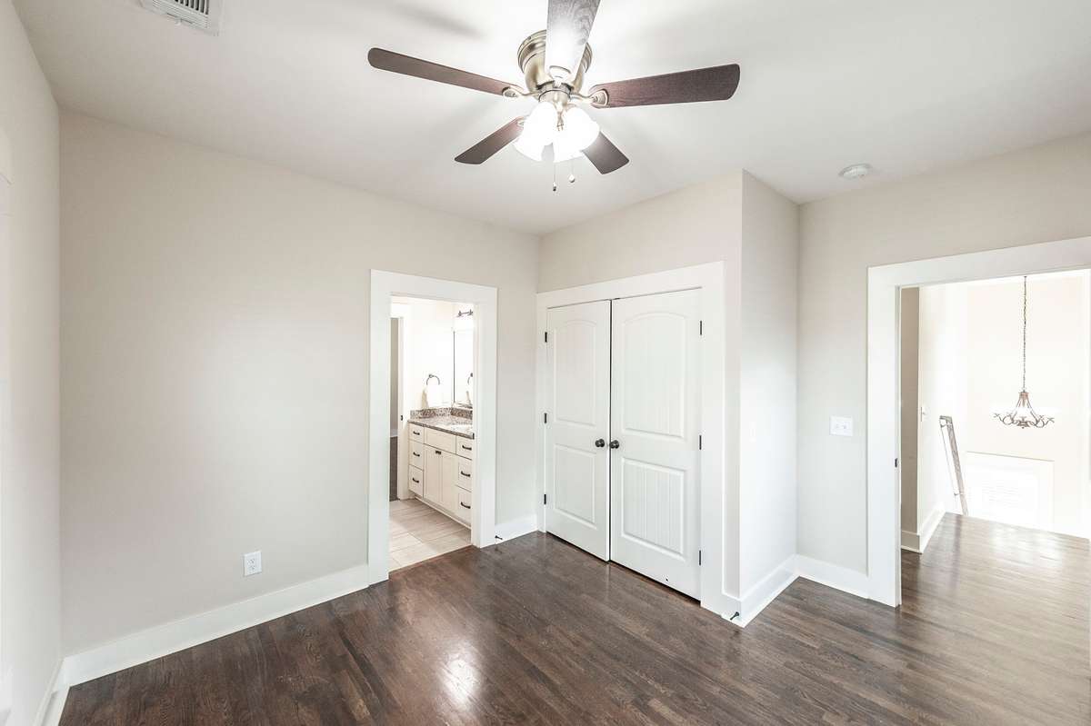 Guests enjoy convenient access to the shared Jack-and-Jill bathroom, enhancing functionality and privacy.