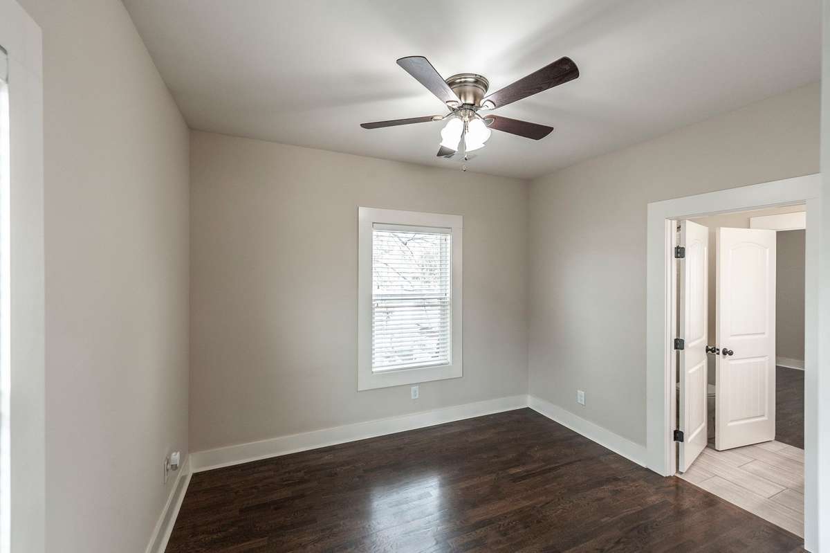 Each guest room offers plenty of natural light and a comfortable layout for family or visitors.