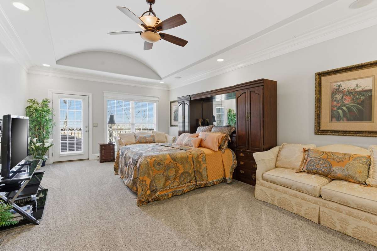 First Floor Primary Bedroom with Private Deck