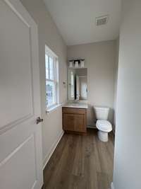 Powder room off of kitchen