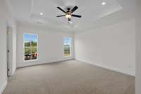 Master Bedroom comes with Trey Ceiing, ceiling fan and lots of can lights.