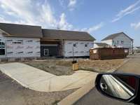 Side view of Madeline with Detached Garage that creates a very nice covered back porch/breezeway