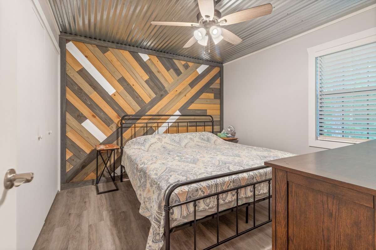 Bedroom Number 1 with Beautiful Feature Wall!