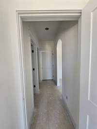 hallway from bed 2 looking toward garage entrance