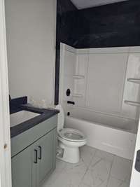 downstairs full guest bath