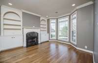 Home Office with built-ins and a gas fireplace for the perfect ambiance while working