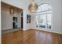 The formal dining sits across from the home office