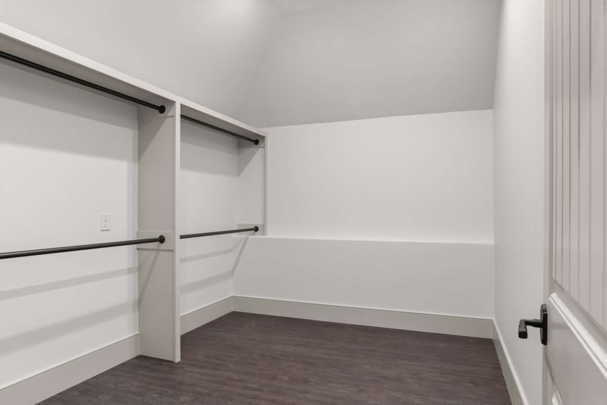 Walk-in closet in the attached apartment.