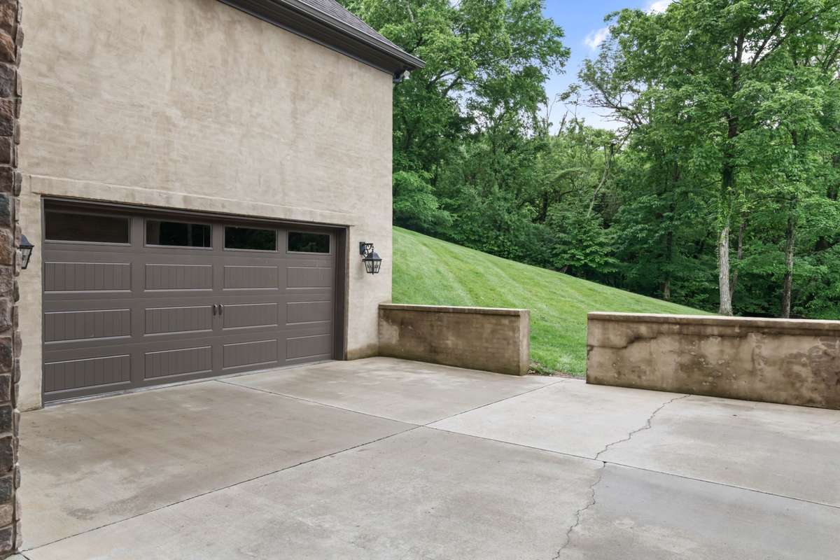 Garage through the porte-cochere. One of two garages.