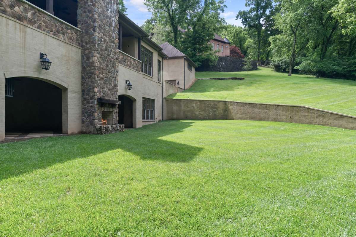 Pool excavation has been completed and back-filled. Pool and hardscape plans are available. The shaded entries open to the ground level patio with 13' ceiling, sound, fans, and two-sided fireplace.