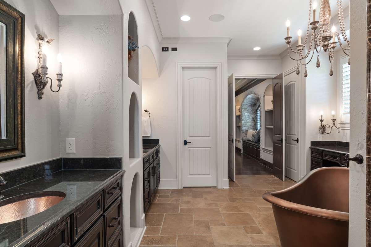 Discrete water closet straight ahead.