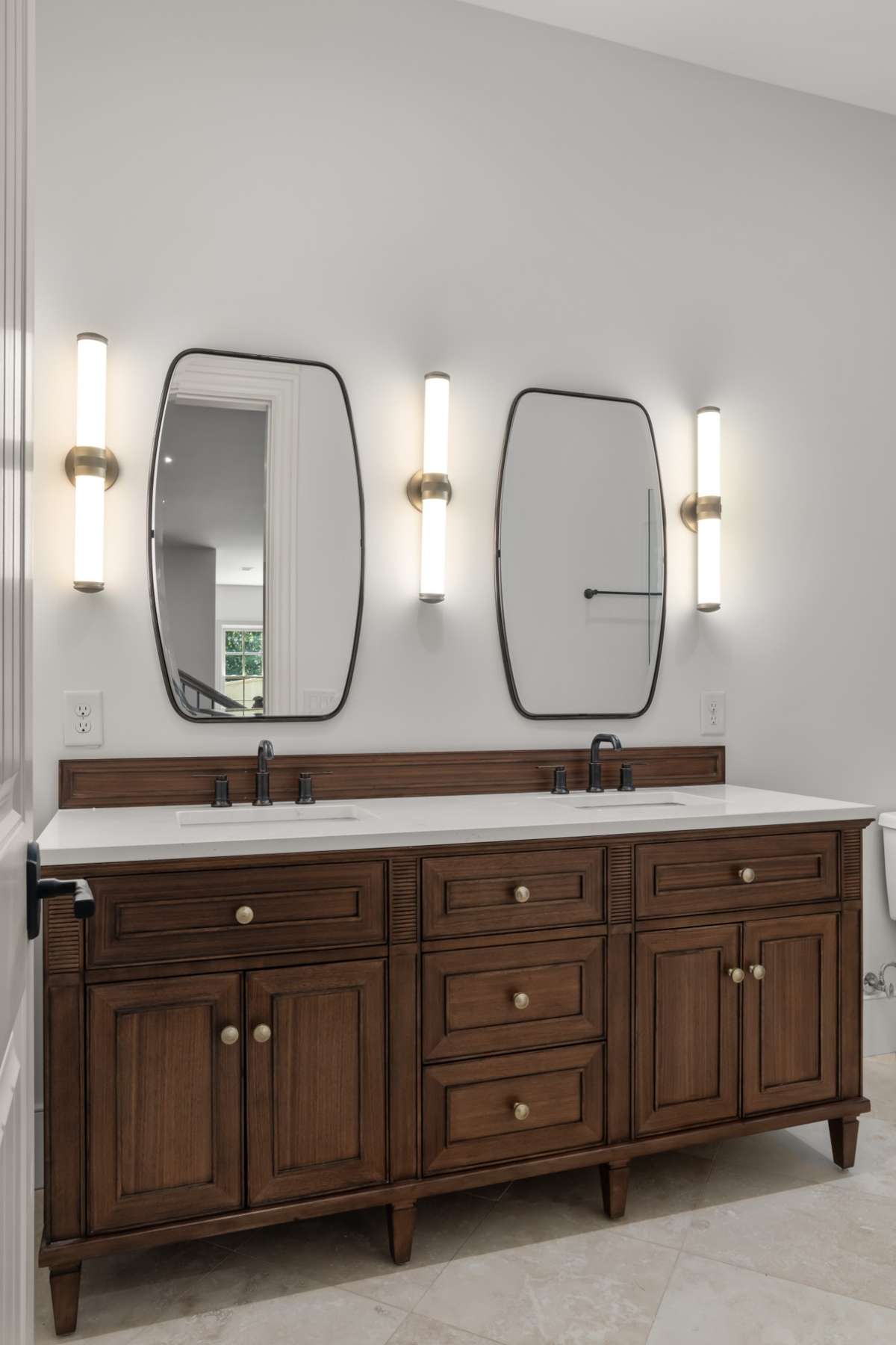 Double vanity in the bathroom for the lower level bonus room.