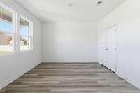 Large Office with double glass doors and spacious closet off they Foyer. Could even be used as a 6th bedroom.