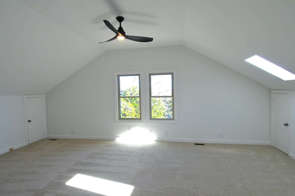There are two large storage closets on each side of the bonus room.