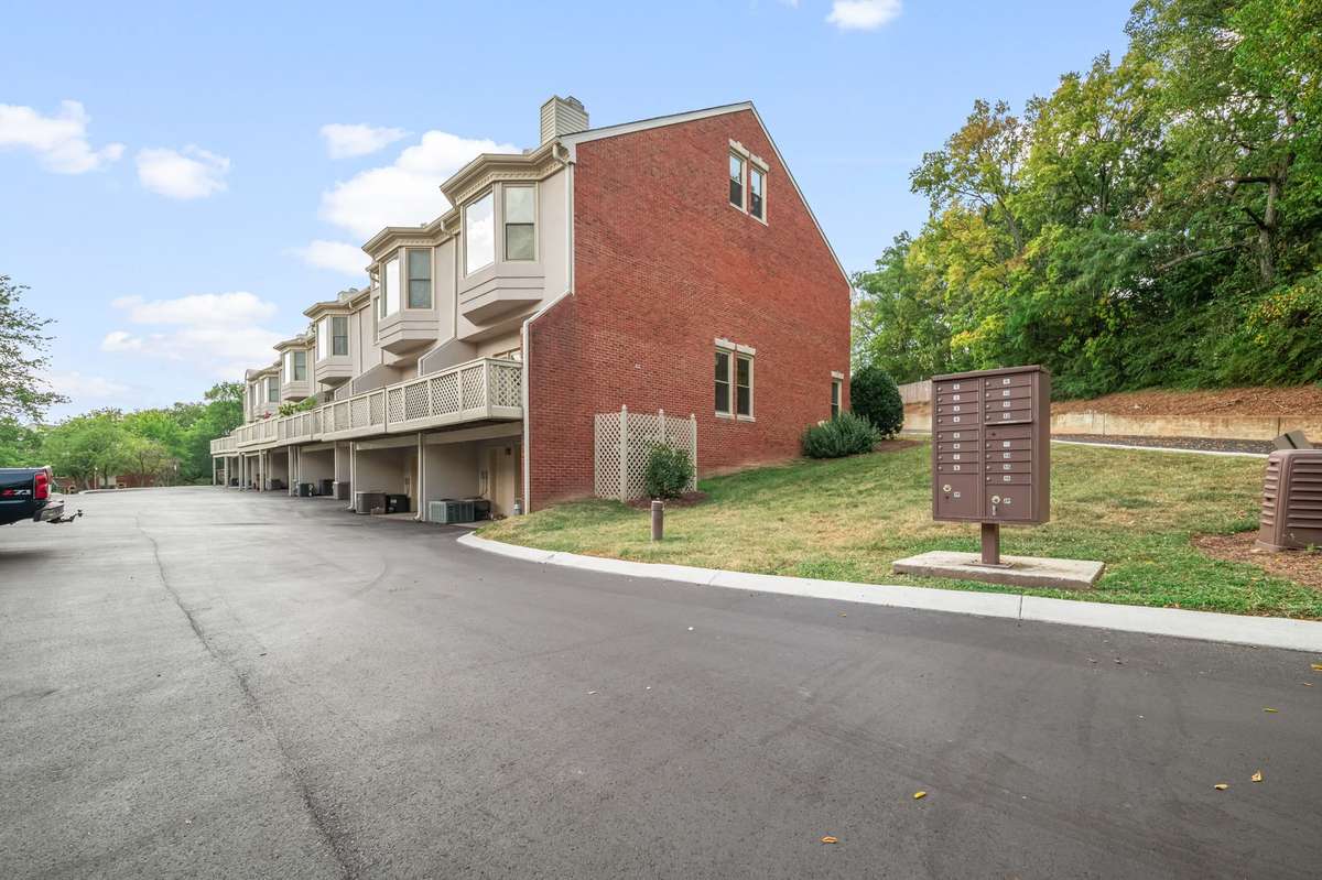 The unit has easy access to the side yard and the central mailbox. It has extra windows since it is an end unit.