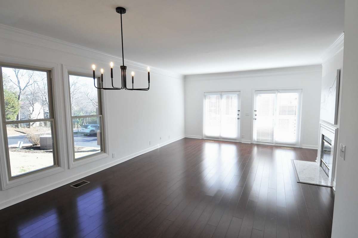 The living room/dining room combination is perfect for entertaining guests.  The two windows, in addition to the French doors, add plenty of light.