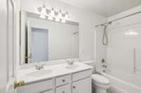 Full bathroom situated between two of the bedrooms.