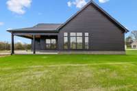 Large covered L shaped back porch