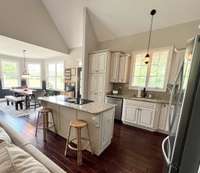 Upgraded kitchen - featuring a brand-new kitchen sink, stylish finishes. Check out the potential for decorating on top of cabinets!!