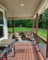 Enjoy the sunset on your deck that circles around to a cozy fireplace.