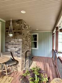 Double-sided Fireplaces - A striking indoor/outdoor feature that brings cozy comfort to the great room and covered deck alike.