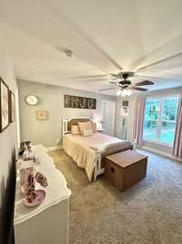 Bedroom 2 is large with a great view and a walk-in closet. This is connected to bedroom 3 with a bathroom with double vanity.