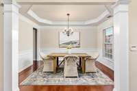 Formal dining room with pass through to kitchen makes for easy entertaining