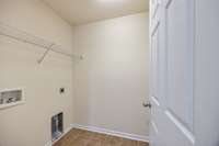 Laundry upstairs with bedrooms